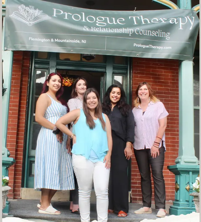 The Prologue Therapy team on the porch of their Main Street office in Flemington, New Jersey